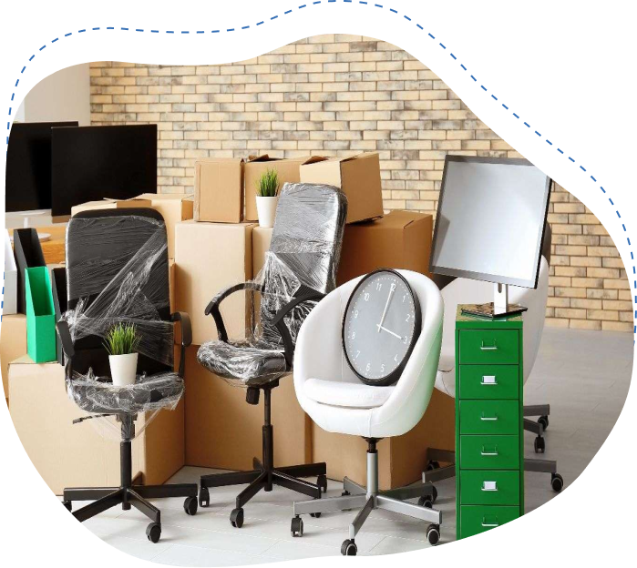 Office furniture including packed chairs and a clock, surrounded by moving boxes, representing commercial moving services in Jacksonville.